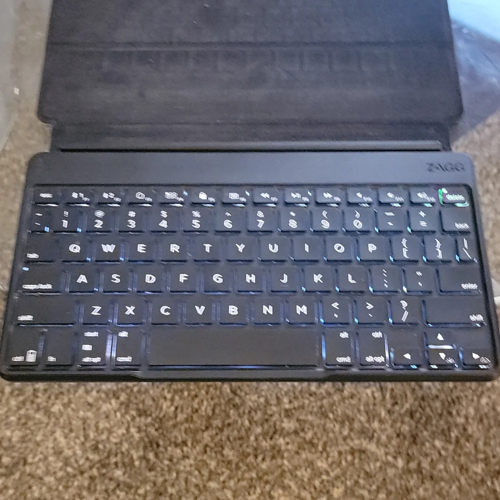 Zagg keyboard for reg sized i pads. Back Lit keys